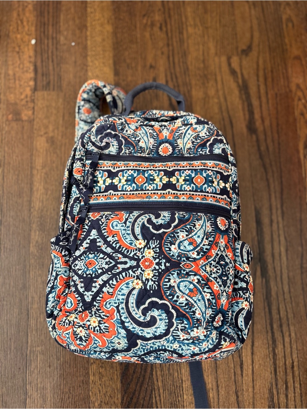 Vera Bradley retired Marrakesh Navy Orange Quilted Backpack wear on bottom